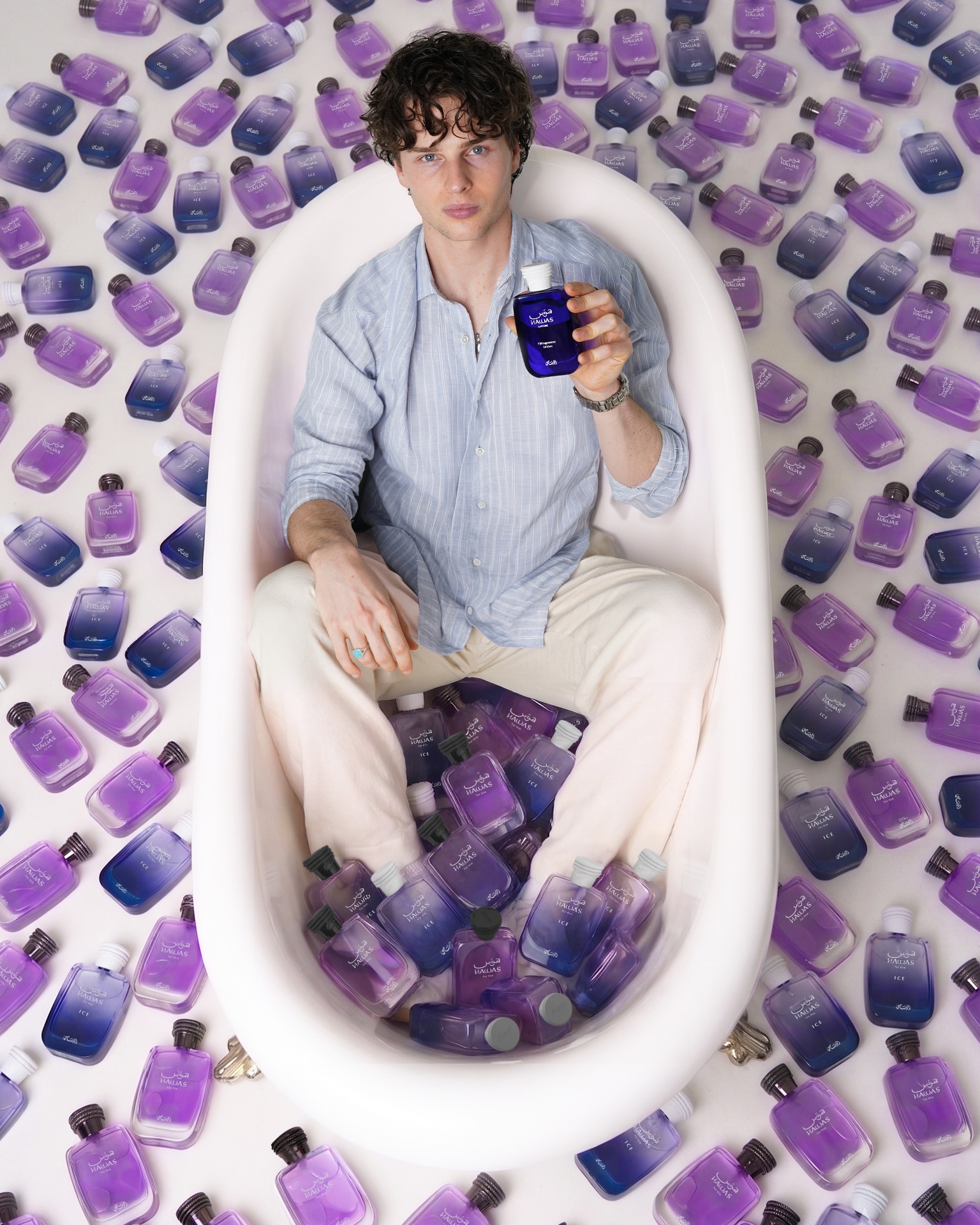 Sapphire bottles spilling around the model